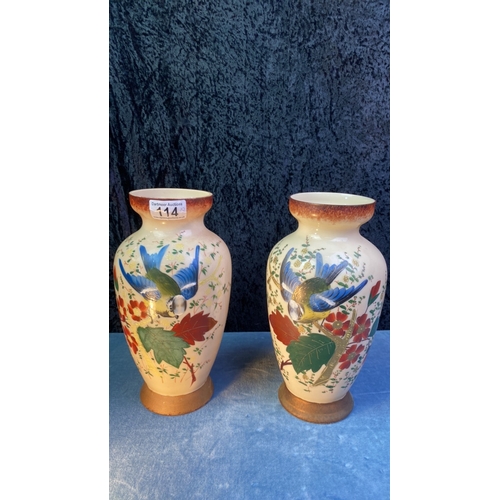 114 - Pair of beautifully hand painted glass vases decorated with Bluetits and flowers H26cm