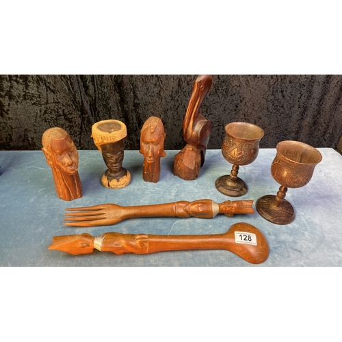 128 - Tremendous collection of handmade wooden items Inc ethnic busts, goblets etc