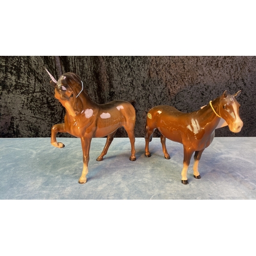 142 - A pair of Beswick horses inc First version 'Horse' 1549 H7.5