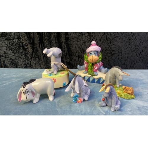 167 - 6 varying figurines, Eeyore in the limelight! Includes one Disney piece, one musical figurine and on... 