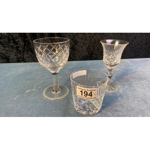 194 - A good collection of glasses for every tipple and includes a fine decanter