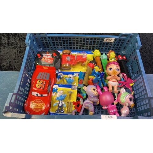 274 - Toys including remote control Lightning McQueen from Cars, DeAgostini Smurfs sealed in blister packs... 