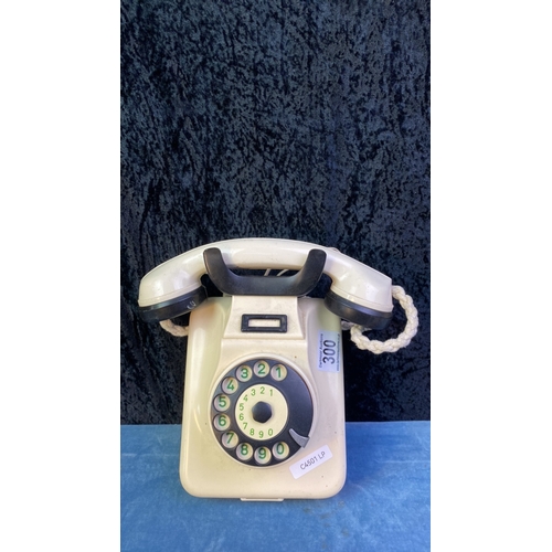 300 - Vintage Bakelite wall-hanging rotary telephone in ivory and black from around the 1950s for old styl... 