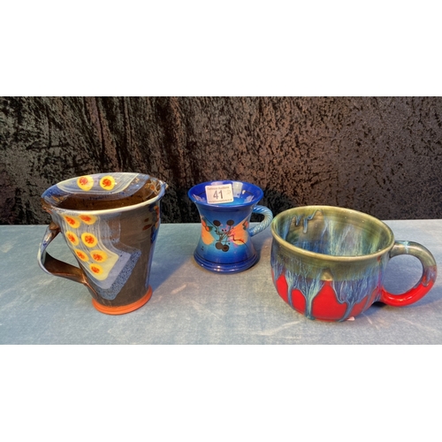 41 - Two studio pottery mugs with signatures on base - one Richard Godfrey, the other signed ‘Tori’ or ‘J... 