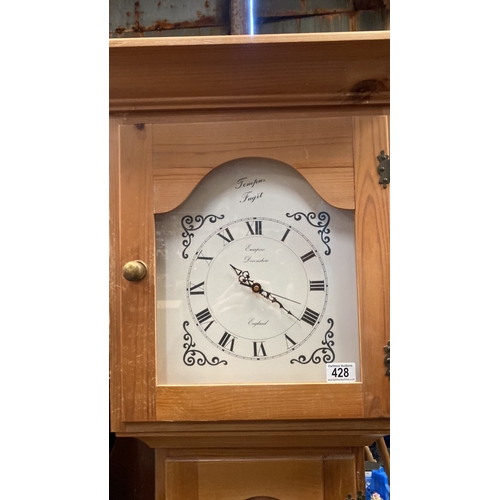 428 - A modern pine cased Grandfather clock with battery operated movement and useful storage space in the... 