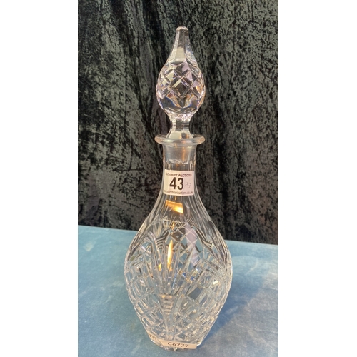 43 - Three cut glass decanters