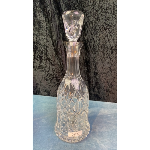 43 - Three cut glass decanters