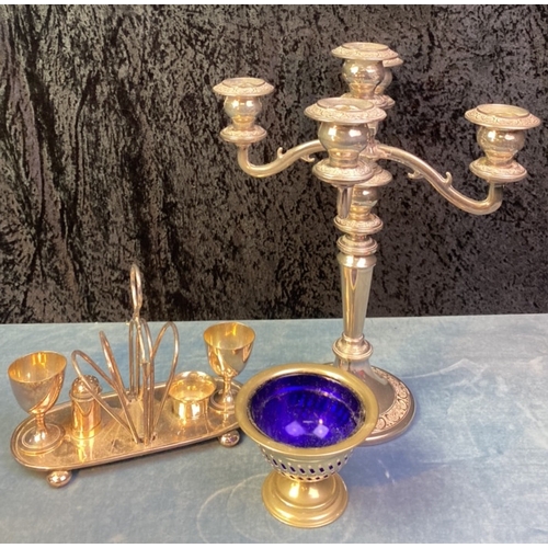 49 - Quantity of silver plated items including candelabra, tea caddy, bowls, toast racks etc along with t... 