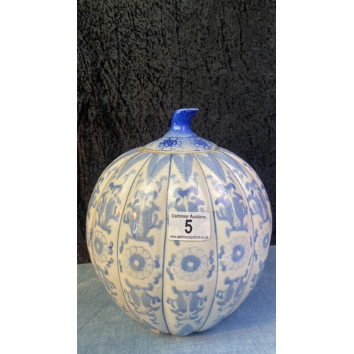 5 - Oriental / Chinese blue and white pumpkin shaped lidded vase, approx 27cm tall