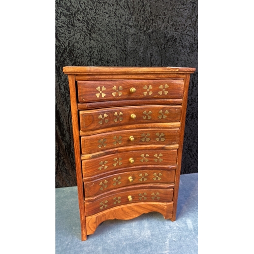 60 - Miniature chest of drawers with inlaid brass detail, approx 36cm tall