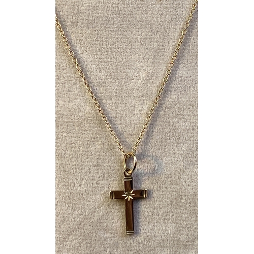 647 - 9ct gold crucifix with inset diamond on 9ct gold chain, 1.5g