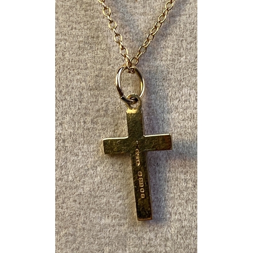 647 - 9ct gold crucifix with inset diamond on 9ct gold chain, 1.5g