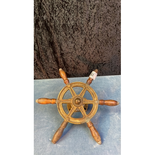 68 - Small brass ship's wheel with wooden handles, diameter 27cm (handle to handle)