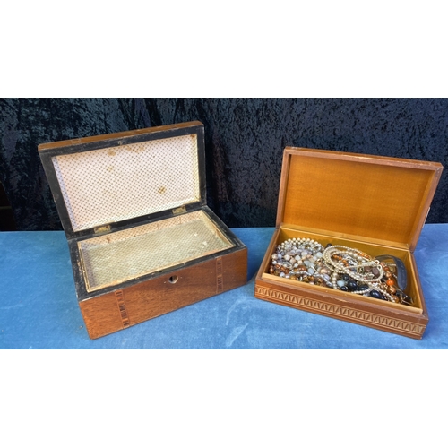 72 - Two wooden boxes, one with carved lid containing costume jewellery and one with inlaid detail and in... 