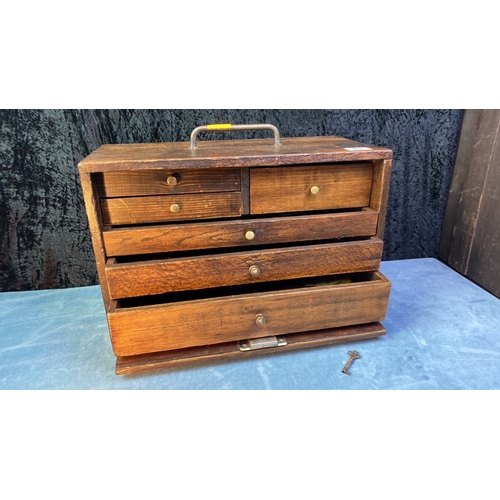 83 - A wooden toolmaker’s chest with working key and beautiful brass detailed handles. Tools inside also ... 