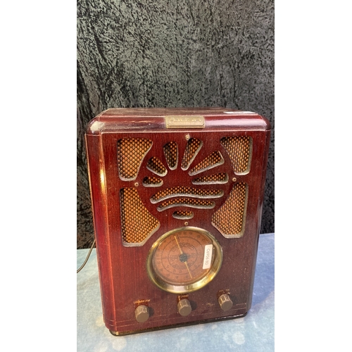 89 - Beautiful cherry red varnished modern Bush radio - tune in for The Archers?