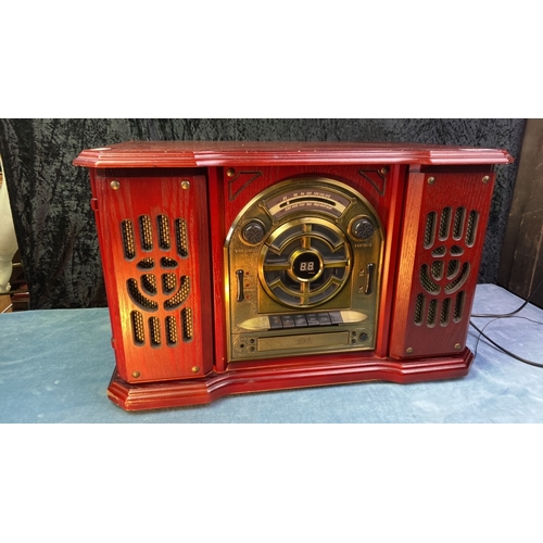 90 - A cherry red varnished modern combination CD, record player, cassette player and radio