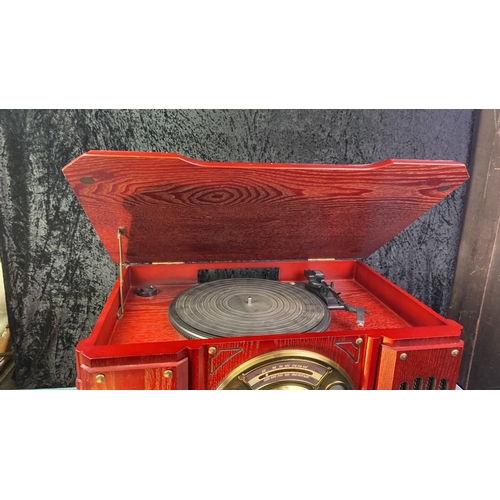 90 - A cherry red varnished modern combination CD, record player, cassette player and radio