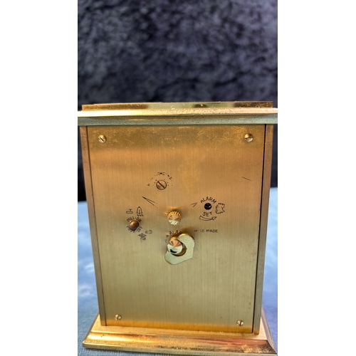 12 - Swiza brass cased mantle / carriage clock, 12,5cm tall, in working order