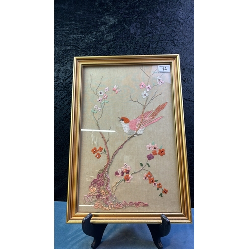 14 - Oriental style embroidered picture with pink bird and flower design, frame measures approx. 48cm x 3... 