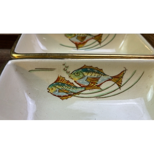 20 - Grays Pottery rectangular hors d'oeuvres dishes and plates with fish designs in a wooden tray