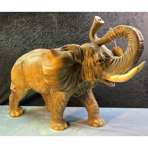 29 - Large resin elephant, repair to one tusk, like current buns, approx. 48cm tow to trunk