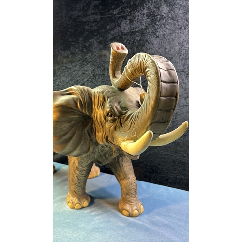 29 - Large resin elephant, repair to one tusk, like current buns, approx. 48cm tow to trunk