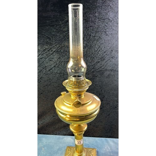 33 - Brass oil lamp with funnel, approx. 68cm tall incl. funnel