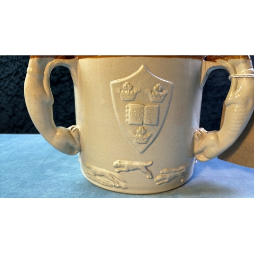 39 - Large three handled salt glazed hunting tankard with hound shaped handles, depicting the University ... 