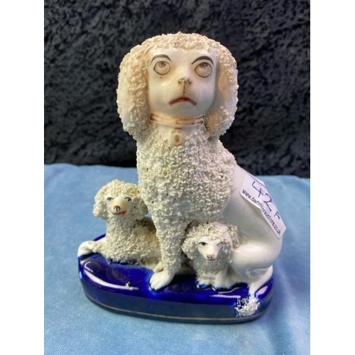 42a - Antique 19th Century Staffordshire poodle figurine, 15cm tall