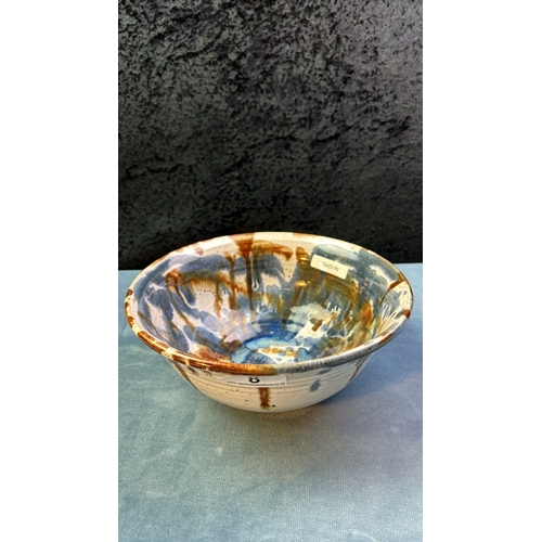 8 - Studio pottery bowl with blue and brown glaze design and fish maker’s mark, 21.5cm diameter