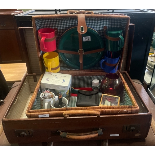 919 - Lovely wicker picnic hamper with some contents, along with a vintage leather suitcase.