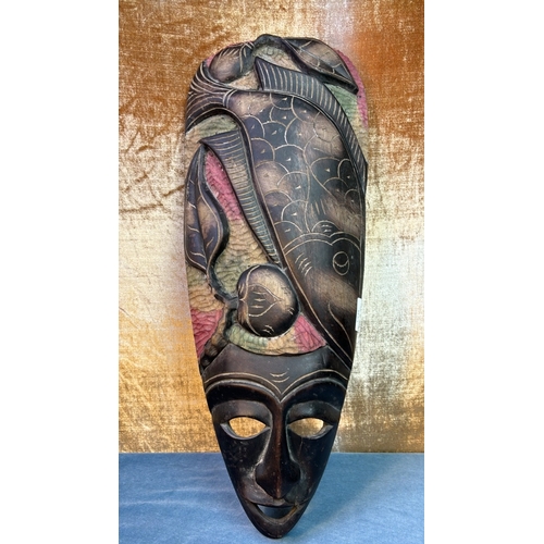 42 - Large ethnic African carved mask with hand painted detail, approx. 62 cm tall