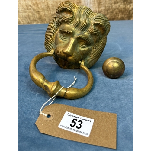 53 - Brass lion head door knocker with fitting, head measures approx. 12 cm x 11cm