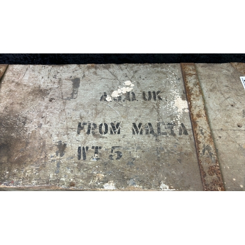 135 - A wooden military trunk with metal banding labelled up 'From Malta'