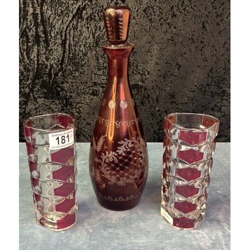 181 - Ruby glass decanter and two goblets