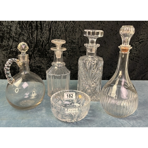 182 - 4 glass decanters and a cut glass bowl