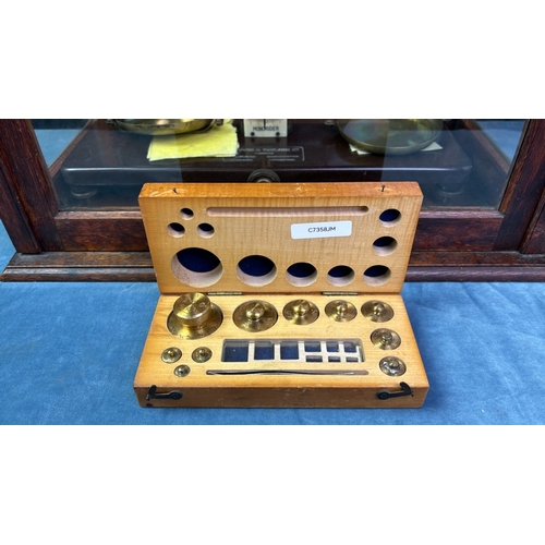 59 - Set of Griffin and Tatlock cased scales with box of brass weights