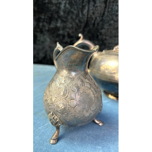 69 - Good collection of silver plate including an Elkington domed ice bucket, a wine cooler, teapot, a We... 