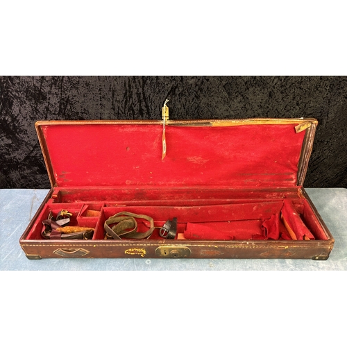 100 - A leather carrying case with reinforced corners, poss for an instrument of some description Bears th... 