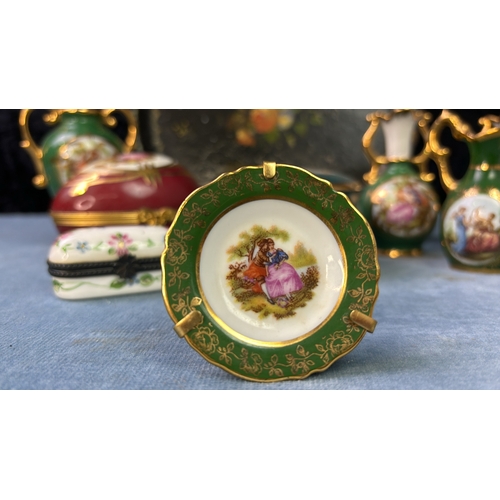 129 - Exquisite collection of Limoges and Coalport miniatures, hand painted and presented on a pretty tray... 