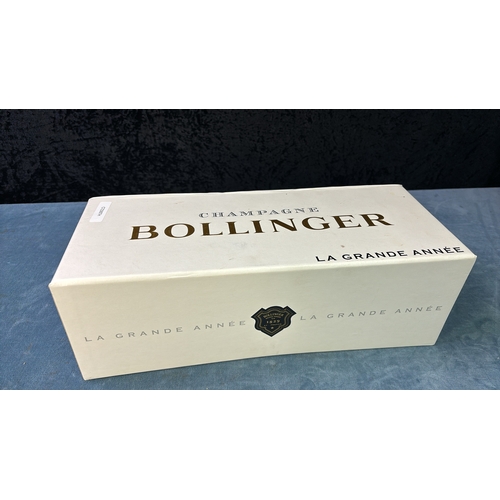 144 - A fabulous bottle of a superior Champagne, La Grande Annee Bollinger, in original box