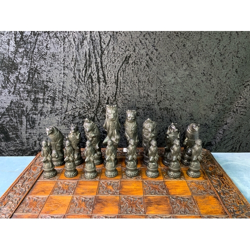 195 - A Grand Collector Reynard the Fox Chess Set with very decorative chess board 60x60cm. Black and Crea... 