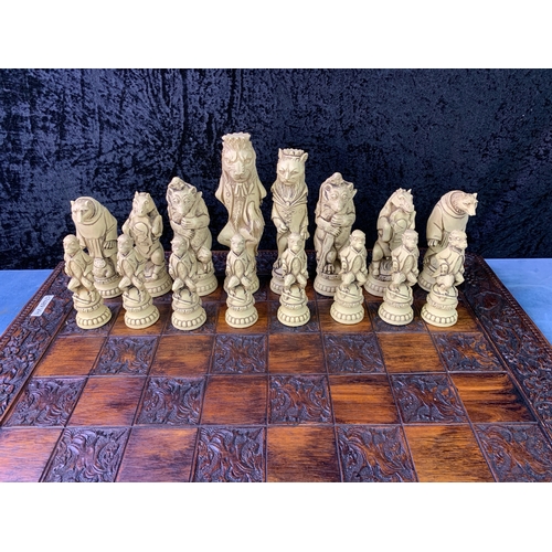 195 - A Grand Collector Reynard the Fox Chess Set with very decorative chess board 60x60cm. Black and Crea... 