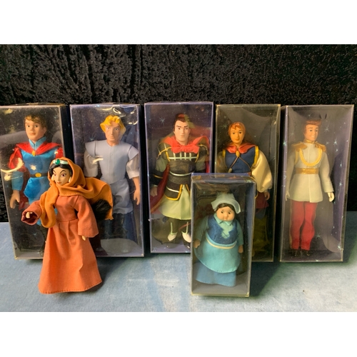 223 - A collection of DeAgostini Disney character (15 in total, 14 boxes) along with several dolls includi... 