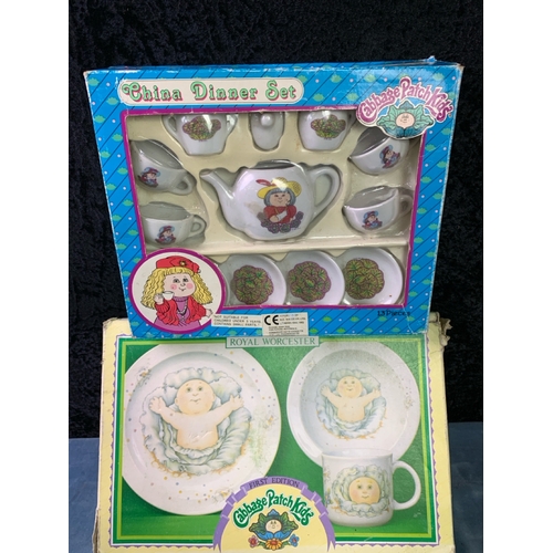 225 - Care Bears Care-a-lot castle carry set and car (both a/f) along with two vintage boxed  Cabbage Patc... 