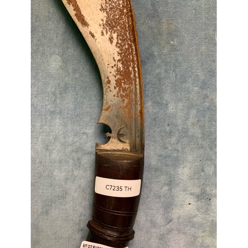 290 - Wooden handled Kukri knife in leather scabbard, possibly WWII British Army / Gurkha issue