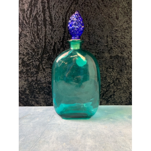 309 - Turquoise coloured glass bottles with grape design stoppers and a large glass fruit bowl