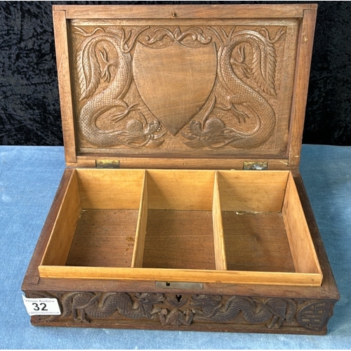 32 - Fabulously carved Oriental style wooden box with snake / serpent / dragon designs, approx 13cm x 30c... 