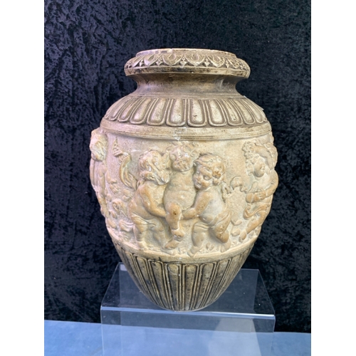 384 - Heavy antique china vase decorated with raised putti / cherub figures, approx 30cm tall